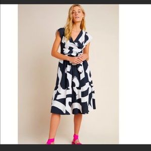 Maeve Anthropologie black and white midi dress with pockets.